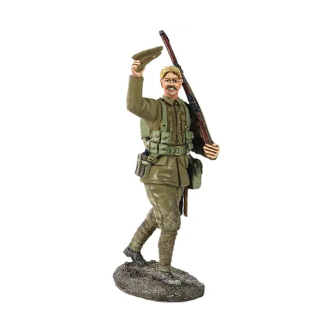 Metal figurine of 1914 British Infantry marching  figurine features a green uniform and helmet. The figurine is in a walking formation holding a rifle and waving his hat, on a textured base. 