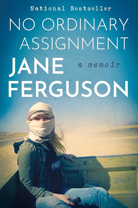 The cover for No Ordinary Assignment is a colored photograph of a woman wearing a bullet proof vest, jeans, and a white head scarf. She sits in the back of a pickup truck bed as it traverses a desert. 