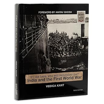 This image shows a black and white photograph of a large ship. There is a smaller ship next to the larger one and it is full of men wearing Indian WWI style uniforms. 