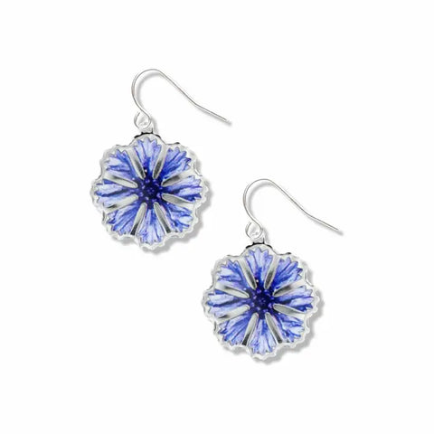 Silver colored corn flower earrings. They are blue and made to drop down a little from the ear.