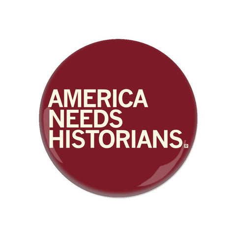 A dark red button with text that reads, "America needs historians".