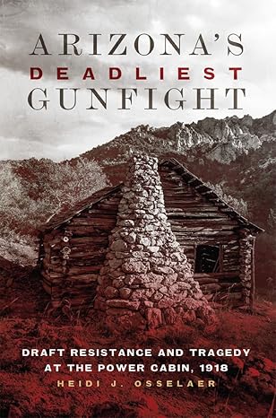 The cover is a red toned photograph of a privative and old log cabin with a large stone fireplace. The cabin appears to be in the Arizona desert. 