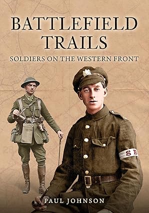 Sepia toned book cover showing two World War I soldiers in British uniform. One soldier stands in the background holding a rifle and wearing a helmet, while a younger soldier sits in the foreground wearing a peaked cap and an armband marked SR.