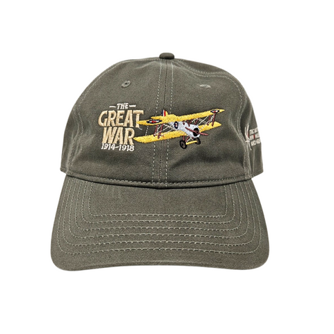 An off gray baseball cap with an image of a yellow biplane embroidered on the front. To the left of the biplane text which reads "The Great War 1914-1918".