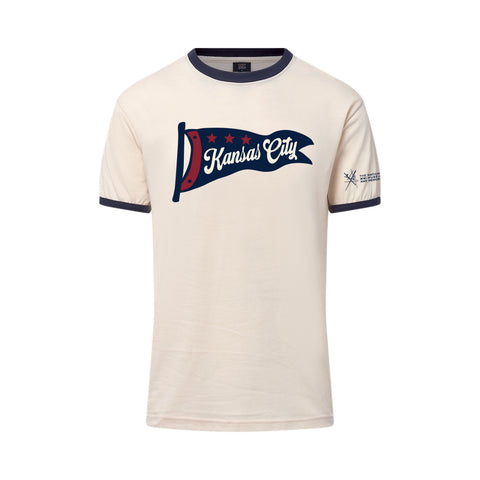 A white tee shirt with a navy and red flag that says Kansas City on it.