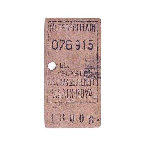 A sticker that depicts a WWI era metropolitan ticket for Paris. It is a rusty red color and has the numbers 076915 on it. There is also faded illegible text in French.