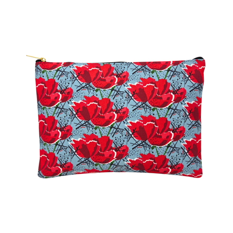 A small rectangular pouch with a bold red poppy pattern on a bluish gray background, featuring a zipper closure. 
