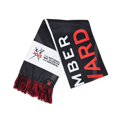 Black, white, and red scarf with text and logos on a black background. It has the logo for The National WWI Museum and Memorial Centennial. 