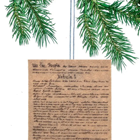 An image of an ornament. It is a felt version of the Declaration of Independence.